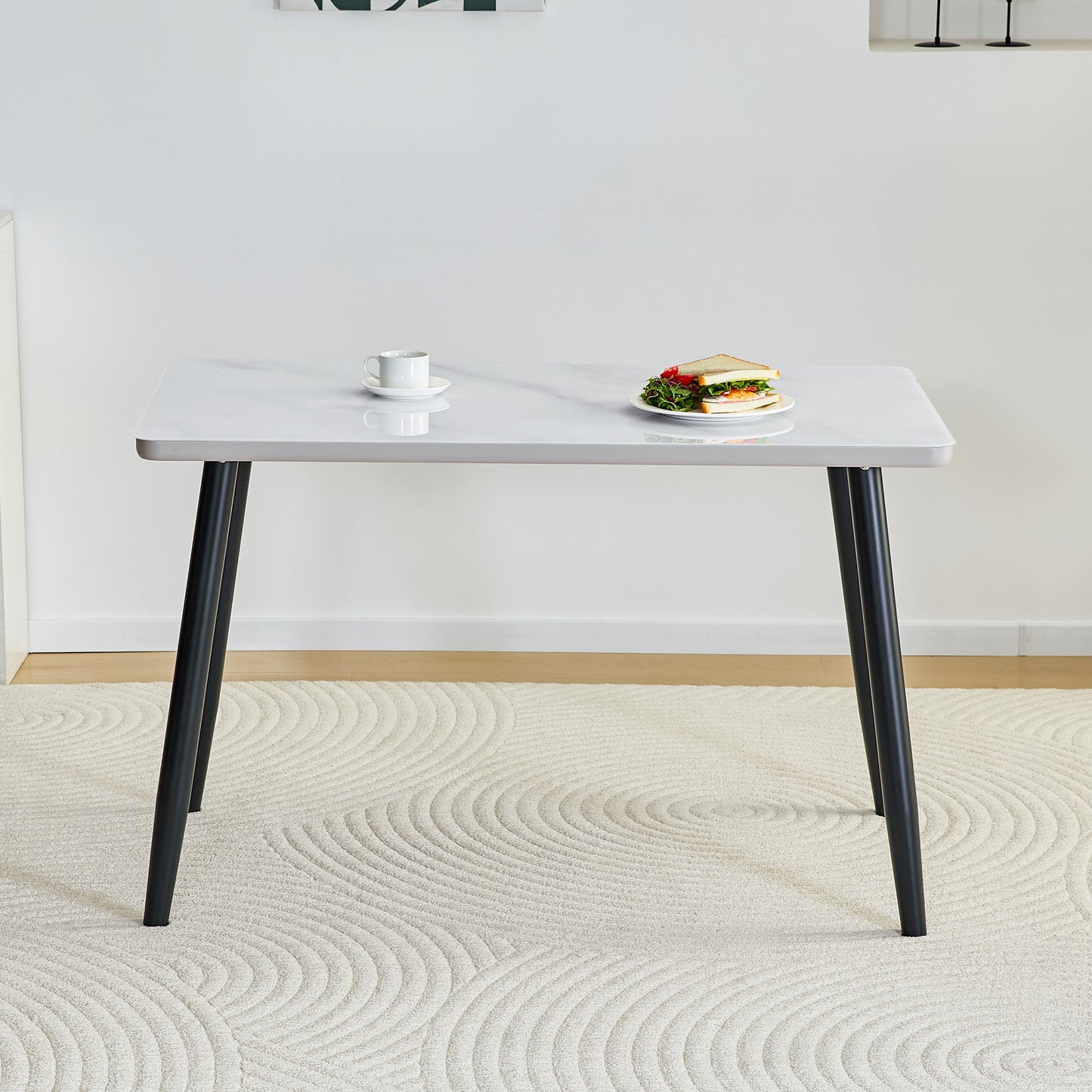 Modern Minimalist Rectangular Dining Table,suitable For 4-6 People.Tempered Glass Countertop Lower MDF Board,imitation Marble Texture,black Metal Tapered Legs.Suitable For Minimalist Restaurants.