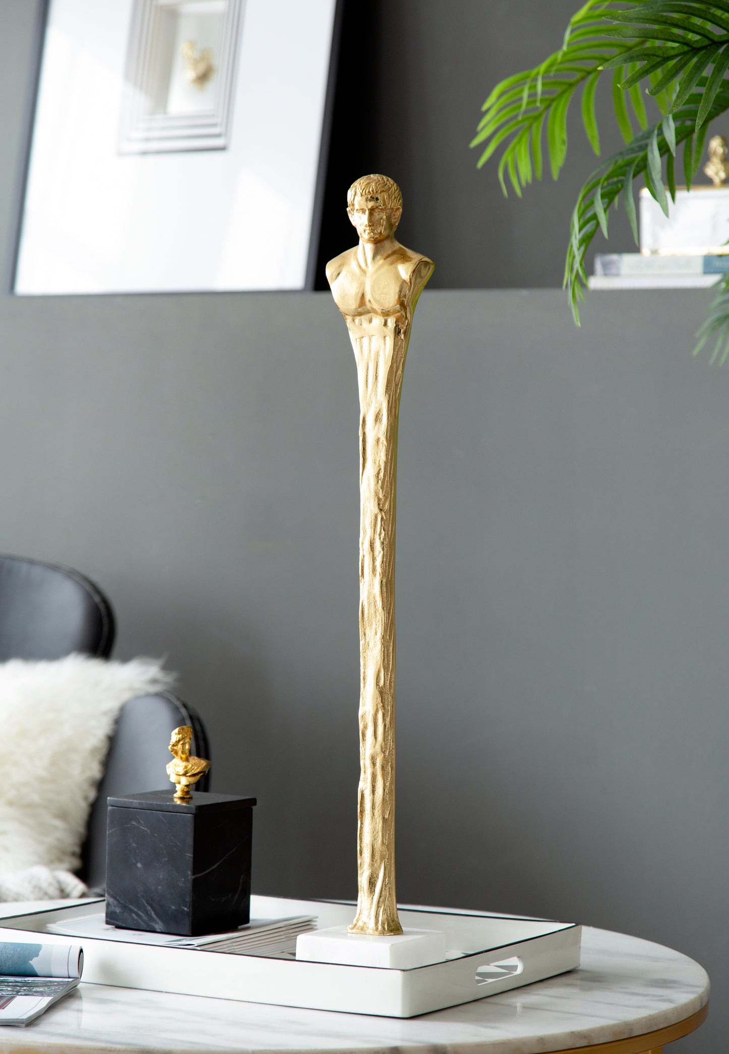 5.5x5.5x32  Elongated Gold Roman Statue On White Marble Base