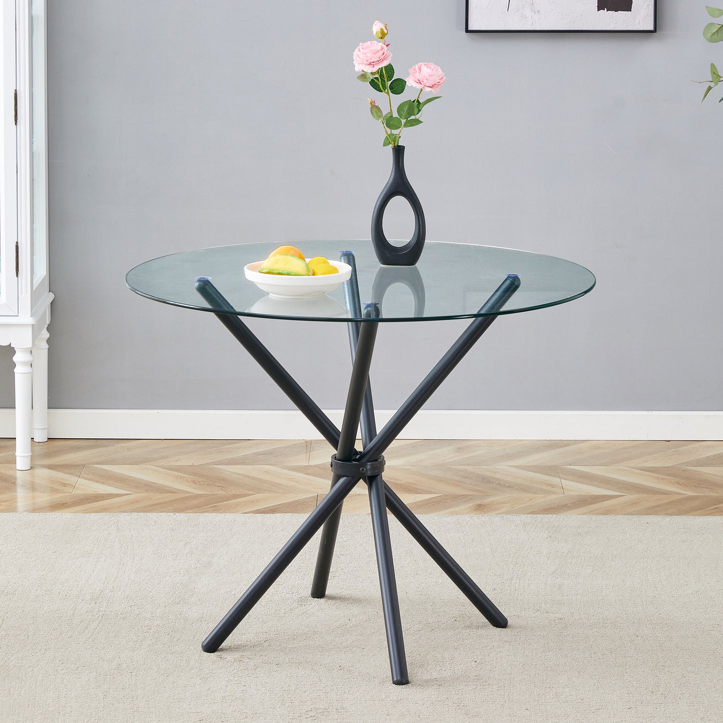 A Circular Transparent Tempered Glass Round Table With A Diameter Of 36.6 Inches,with Ring-shaped Gathered Black Metal Legs.The Desktop Glass Is 0.3 Inches Thick.W1151P294396