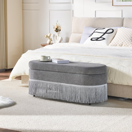 Oval Upholstered Storage Ottoman With Fringe Trim & Lift-Top Lid - 39L X 16W X 17H, Multi-Functional Footrest & Hidden Storage For Living Room Or Bedroom - Grey Fabric With Metal Frame