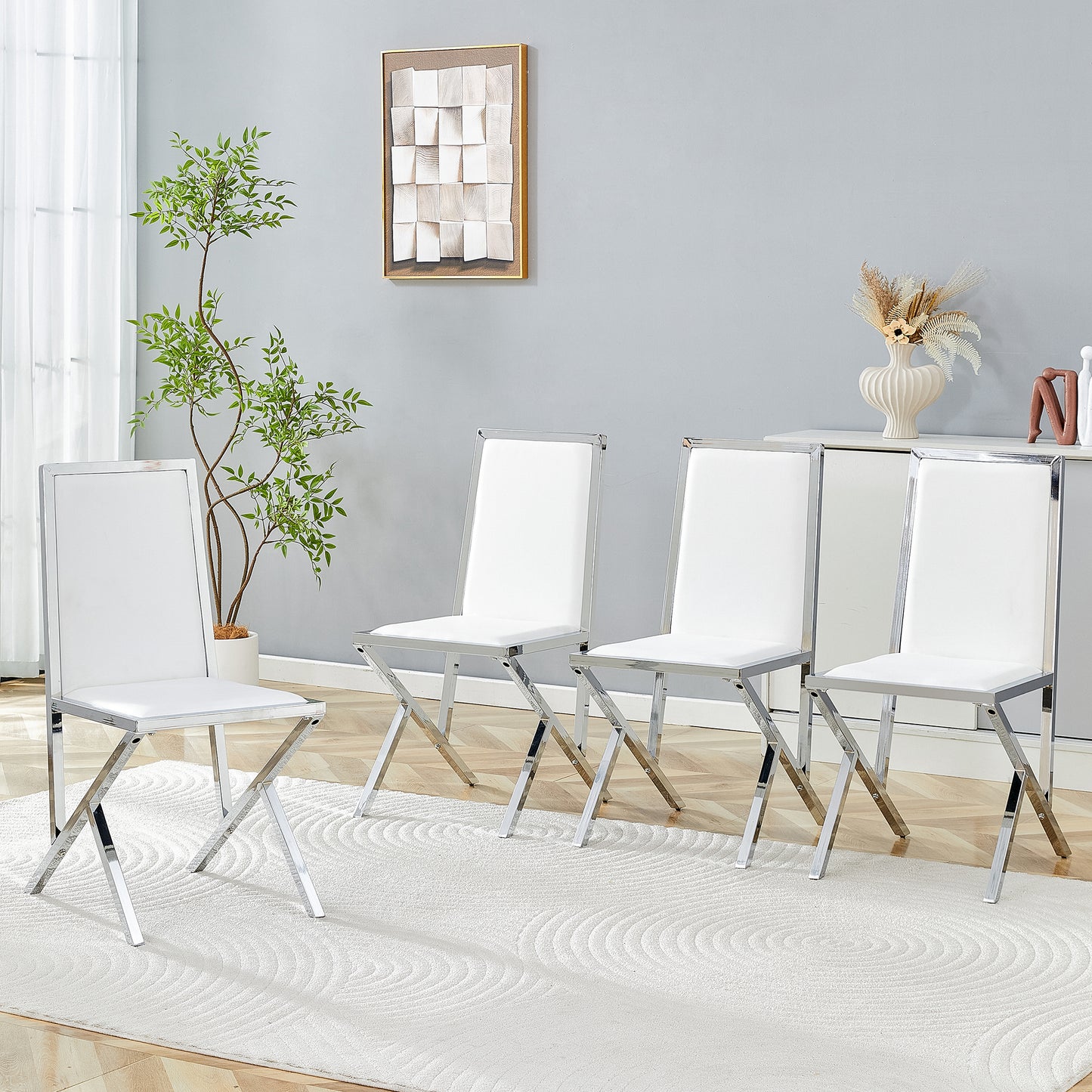 4-pack Silver Metal Framed White PU Dining Chairs Ergonomic Design, A Simple And Luxurious Choice.Featuring Uniquely Designed Silver Metal Legs.