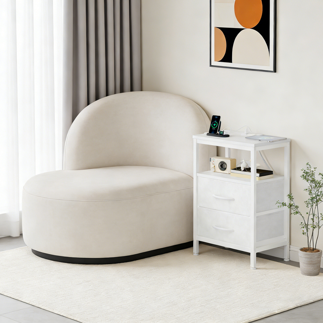 A Small Bedside Table With A Charging Station And Two Fabric Drawers, And A Side Bedside Table