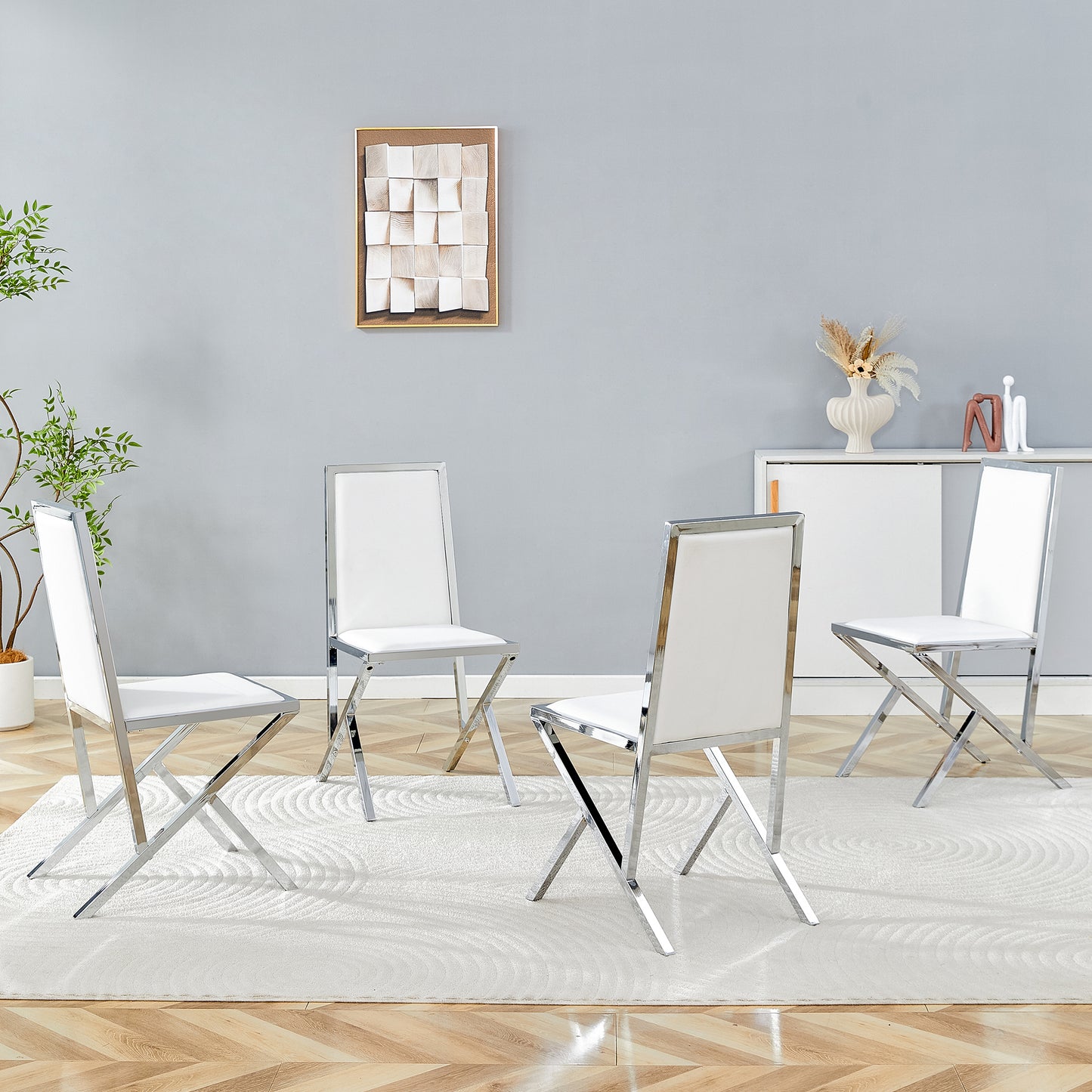 4-pack Silver Metal Framed White PU Dining Chairs Ergonomic Design, A Simple And Luxurious Choice.Featuring Uniquely Designed Silver Metal Legs.