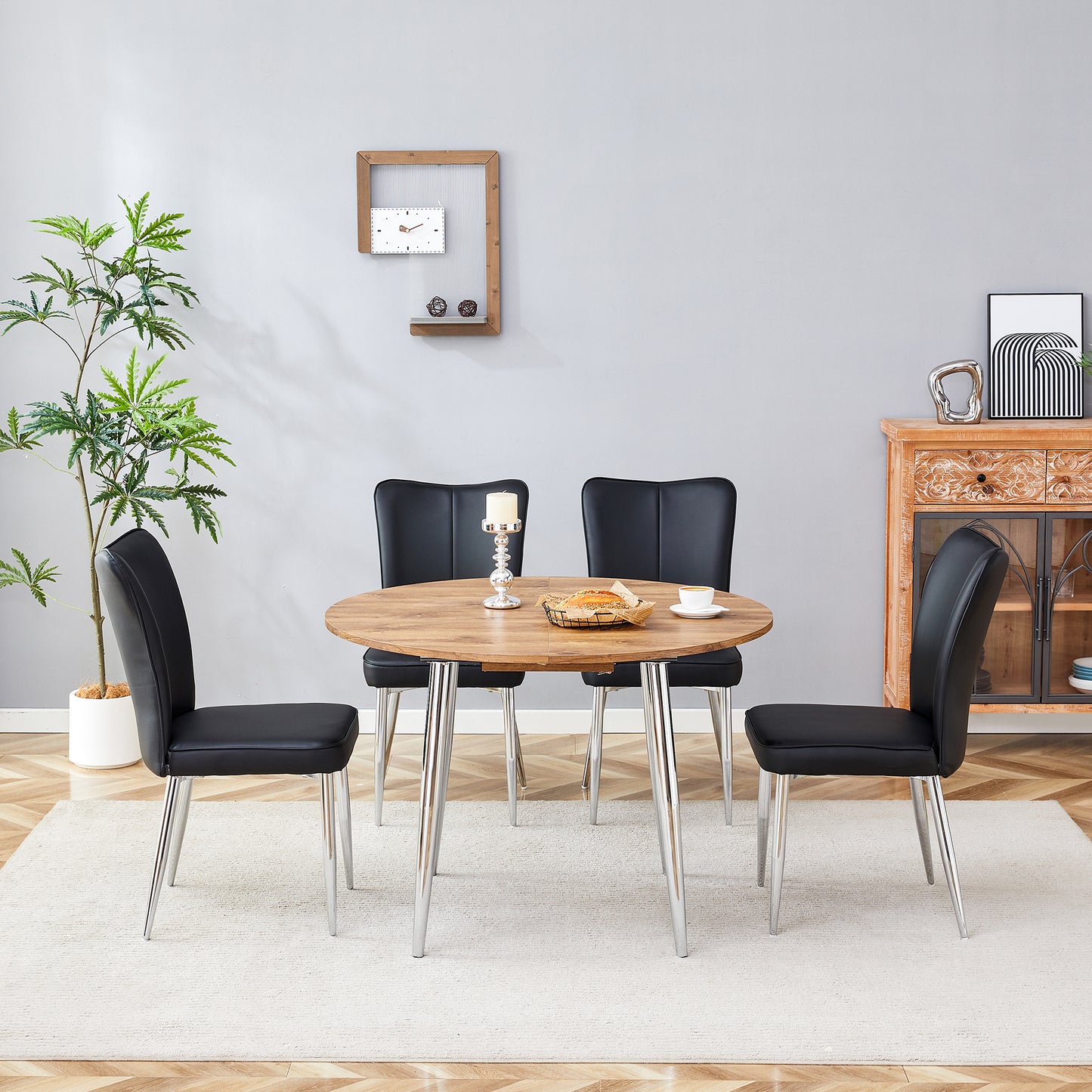 Table And Chair Set.With A Expandable Mechanism,the Wood Grain MDF Table Top And Silver Metal Legs And Has A Smooth Surface.Paried With 4 Black PU Chairs With A Vertical Stripe Design On The Backrest.