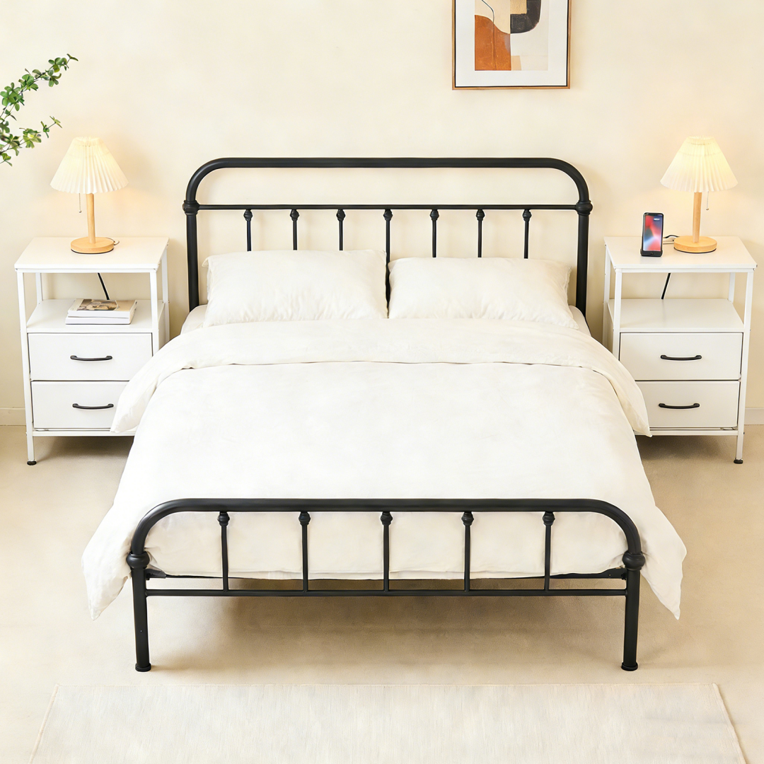 A Small Bedside Table With A Charging Station And Two Fabric Drawers, And A Side Bedside Table