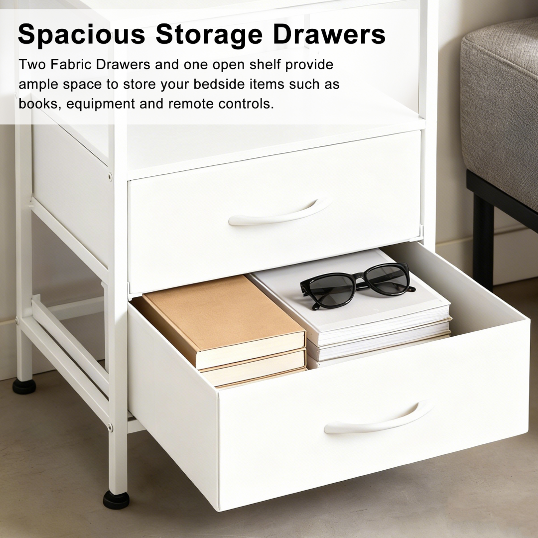 A Small Bedside Table With A Charging Station And Two Fabric Drawers, And A Side Bedside Table