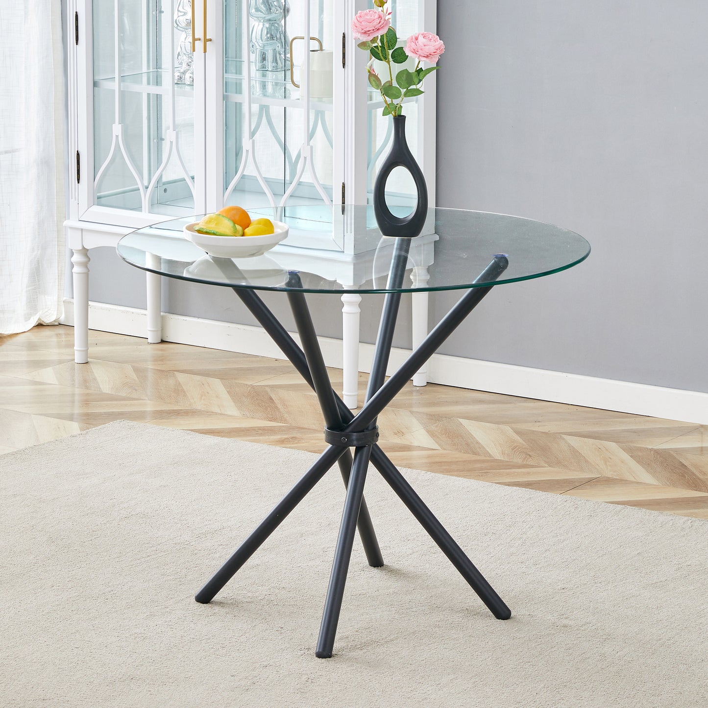 A Circular Transparent Tempered Glass Round Table With A Diameter Of 36.6 Inches,with Ring-shaped Gathered Black Metal Legs.The Desktop Glass Is 0.3 Inches Thick.W1151P294396