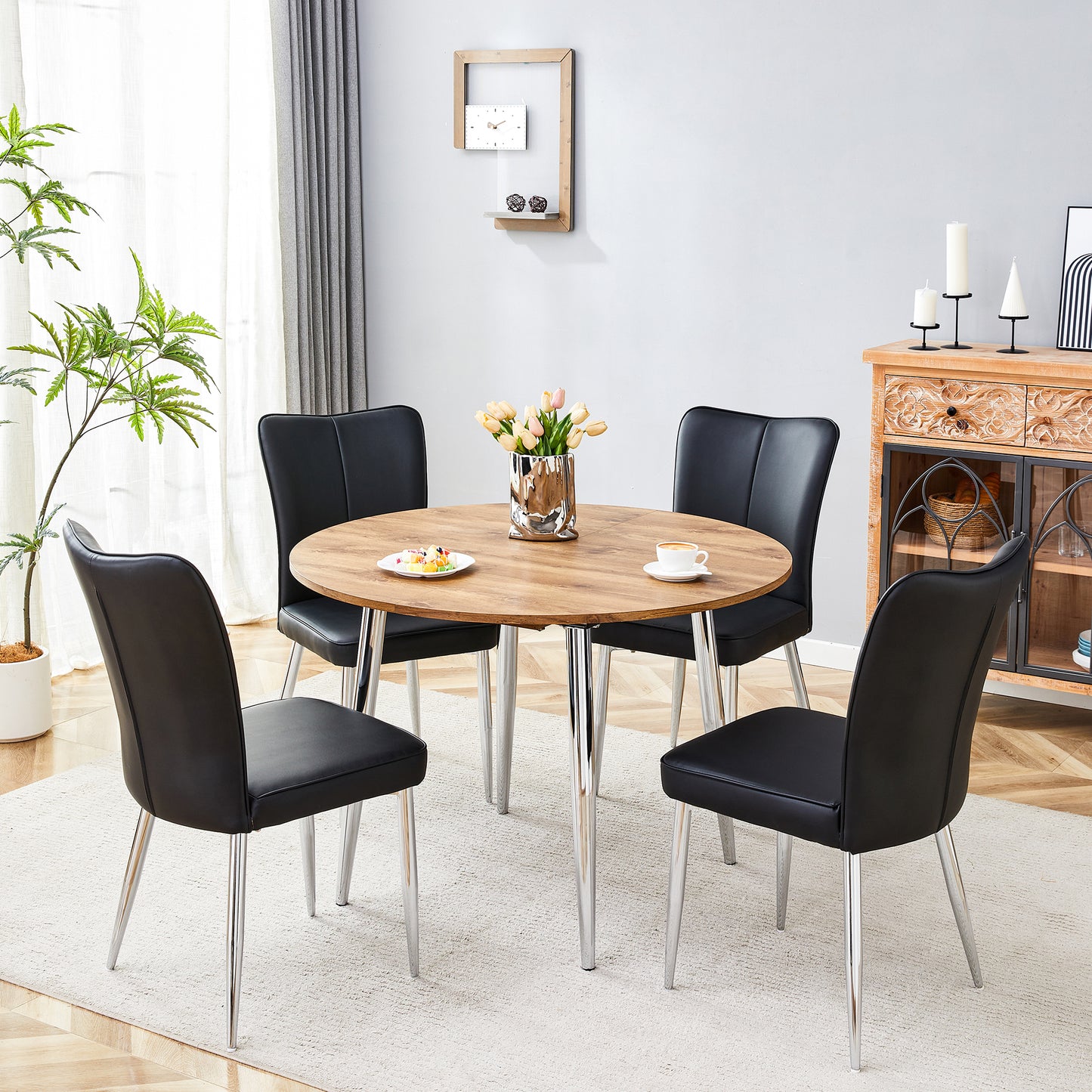 Table And Chair Set.With A Expandable Mechanism,the Wood Grain MDF Table Top And Silver Metal Legs And Has A Smooth Surface.Paried With 4 Black PU Chairs With A Vertical Stripe Design On The Backrest.